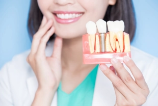 Dental implant treatment helps replace missing teeth with a natural look and long-lasting comfort.